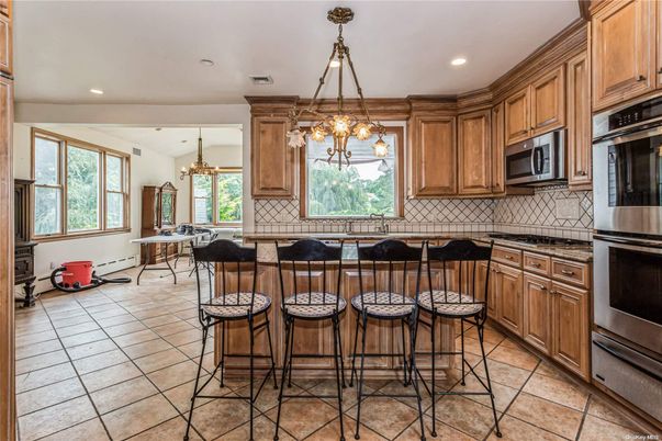 Chandelier, Dining room, Interior, Kitchen, Recessed Lighting, Stainless Steel Appliances
