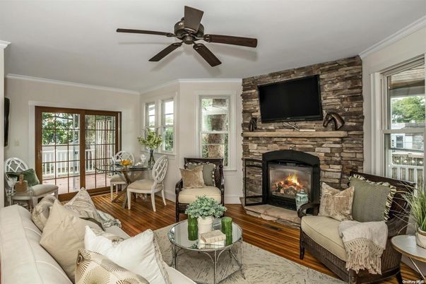 Dining room, Fireplace, Interior, Living room, Stone Walls, Wood Texture Flooring
