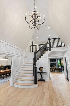 Chandelier, Dining room, Fireplace, Interior, Recessed Lighting, Wood Texture Flooring