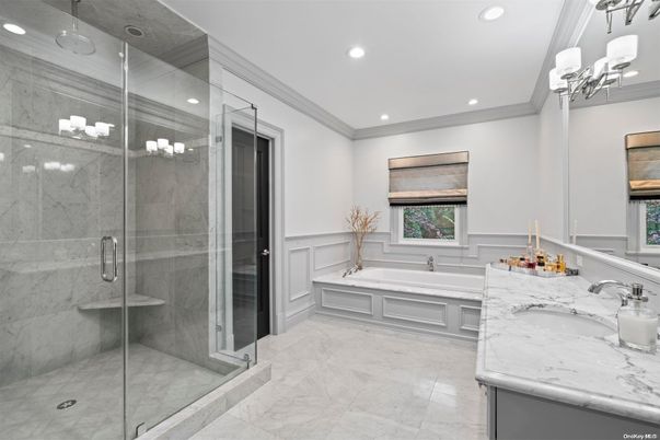 Bathroom, Dual Sink Vanities, Glass Shower, Interior, Marble Walls, Recessed Lighting