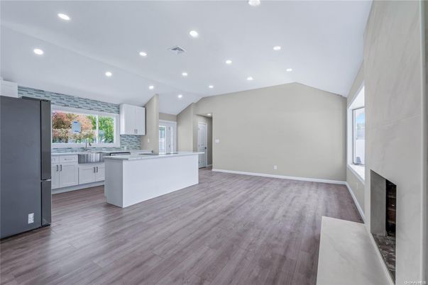 Fireplace, Interior, Kitchen, Recessed Lighting, Wood Texture Flooring