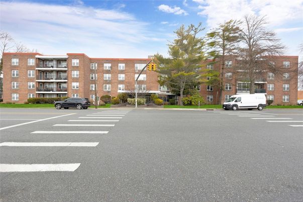 Exterior, Facade, Brick Facade, Condo Building