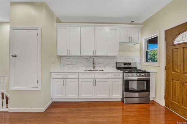 Interior, Kitchen, Marble Walls, Stainless Steel Appliances, Wood Texture Flooring