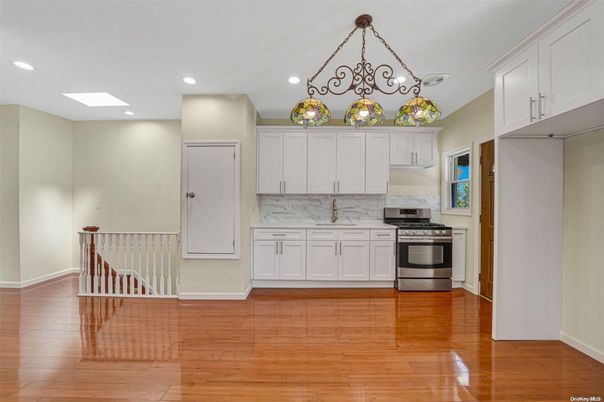 Chandelier, Interior, Kitchen, Pendant Lights, Recessed Lighting, Stainless Steel Appliances, Wood Texture Flooring