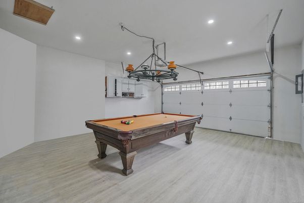 Billiard Table, Chandelier, Game Room, Garage, Interior, Recessed Lighting, Wood Texture Flooring