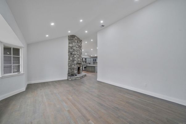 Empty room, Interior, Kitchen, Recessed Lighting, Stone Walls, Wood Texture Flooring