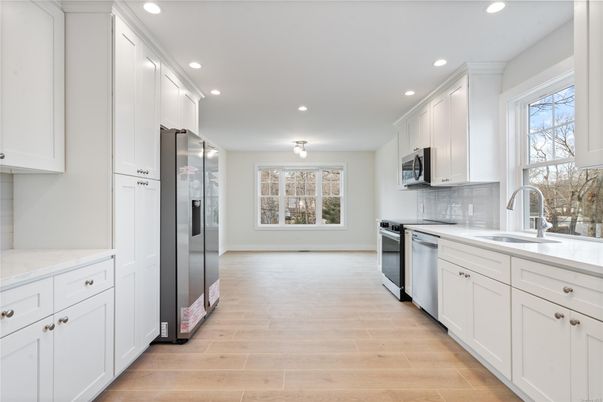 Interior, Kitchen, Recessed Lighting, Stainless Steel Appliances, Wood Texture Flooring