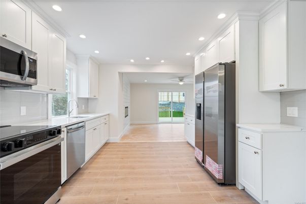 Interior, Kitchen, Recessed Lighting, Stainless Steel Appliances, Wood Texture Flooring