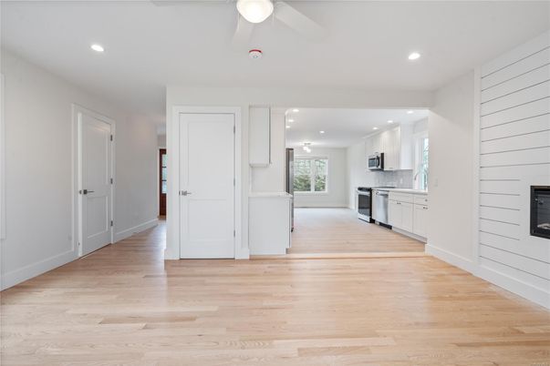 Fireplace, Interior, Kitchen, Recessed Lighting, Wood Texture Flooring