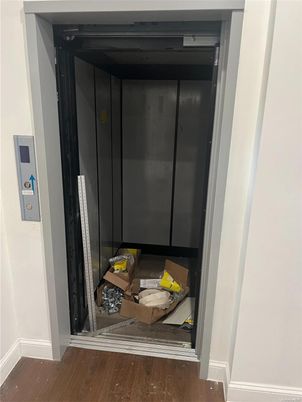 Elevator, Interior, Wood Texture Flooring