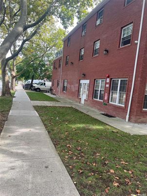Exterior, Facade, Brick Facade, Condo Building