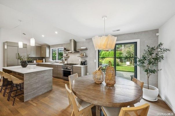 Dining room, Interior, Kitchen, Pendant Lights, Recessed Lighting, Stainless Steel Appliances, Wood Texture Flooring