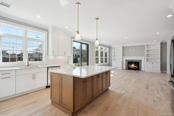 Fireplace, Interior, Kitchen, Pendant Lights, Recessed Lighting, Stainless Steel Appliances, Wood Texture Flooring