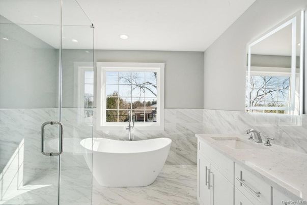 Bathroom, Free Standing Baths, Glass Shower, Interior, Marble, Marble Walls, Recessed Lighting