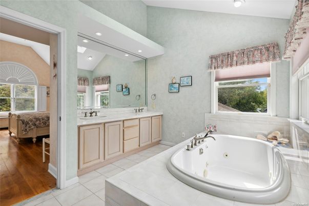 Bathroom, Dual Sink Vanities, Interior, Recessed Lighting, Wood Texture Flooring