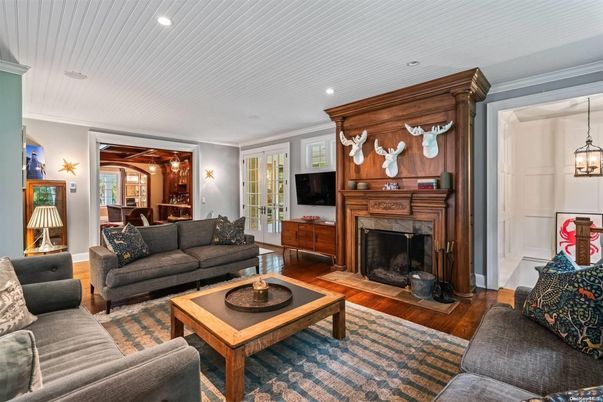 Dining room, Fireplace, Interior, Living room, Pendant Lights, Recessed Lighting, Wood Texture Flooring