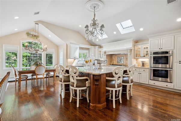Chandelier, Dining room, Interior, Kitchen, Recessed Lighting, Stainless Steel Appliances, Wood Texture Flooring