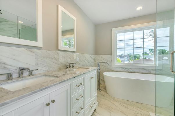 Bathroom, Dual Sink Vanities, Free Standing Baths, Glass Shower, Interior, Marble, Marble Walls, Recessed Lighting