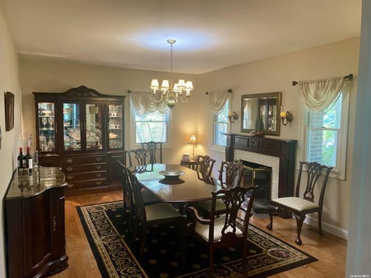 Chandelier, Dining room, Fireplace, Interior, Wood Texture Flooring