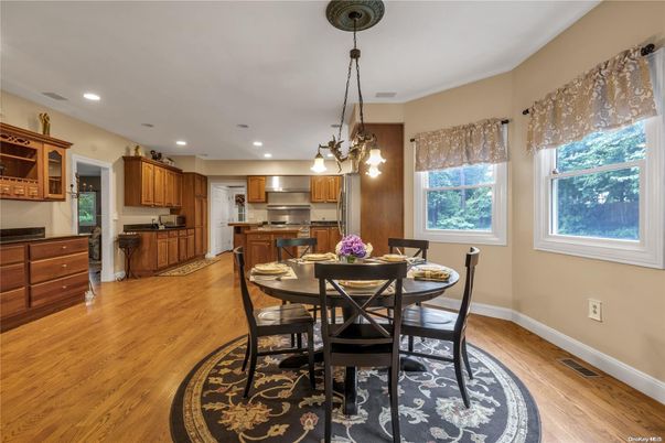 Dining room, Interior, Kitchen, Pendant Lights, Recessed Lighting, Stainless Steel Appliances, Wood Texture Flooring