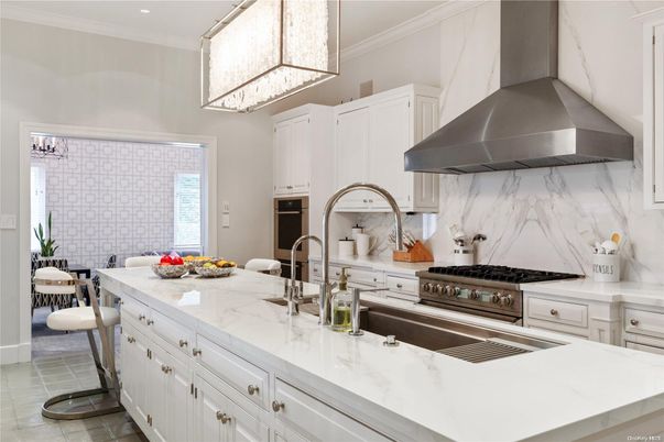 Interior, Kitchen, Marble Walls, Recessed Lighting, Stainless Steel Appliances