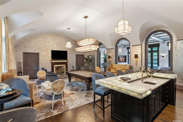 Billiard Table, Dining room, Fireplace, Game Room, Interior, Living room, Pendant Lights, Stone Walls, Wood Texture Flooring