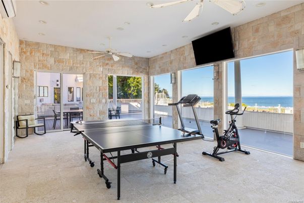Billiard Table, Fitness Equipment, Game Room, Interior, Recessed Lighting, Stone Walls, Water