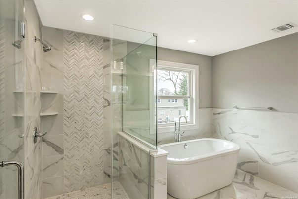 Bathroom, Free Standing Baths, Glass Shower, Interior, Marble, Marble Walls, Recessed Lighting