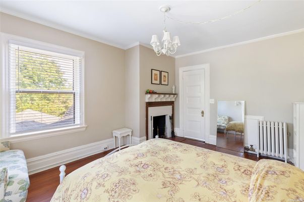 Bedroom, Chandelier, Fireplace, Interior, Wood Texture Flooring