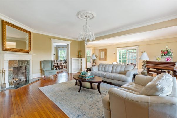 Chandelier, Dining room, Fireplace, Interior, Living room, Piano, Wood Texture Flooring