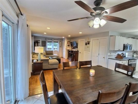 Dining room, Interior, Kitchen, Living room, Recessed Lighting, Stainless Steel Appliances, Wood Texture Flooring