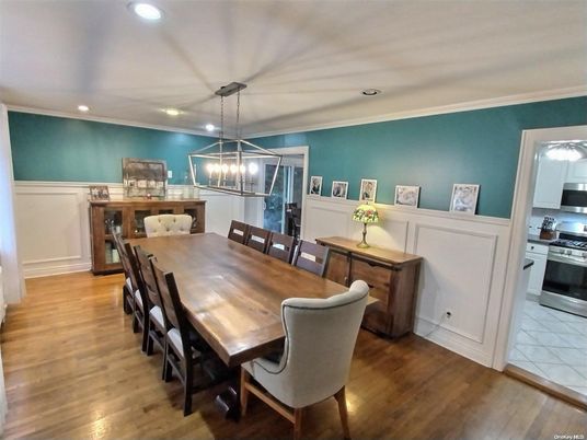 Dining room, Interior, Kitchen, Pendant Lights, Recessed Lighting, Stainless Steel Appliances, Wood Texture Flooring