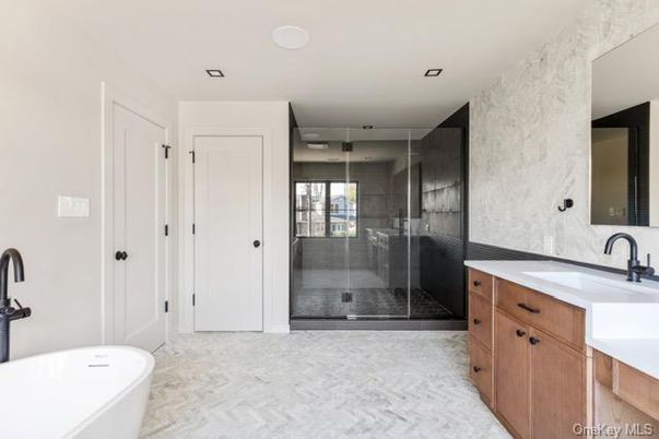 Bathroom, Dual Sink Vanities, Free Standing Baths, Glass Shower, Interior, Marble, Recessed Lighting