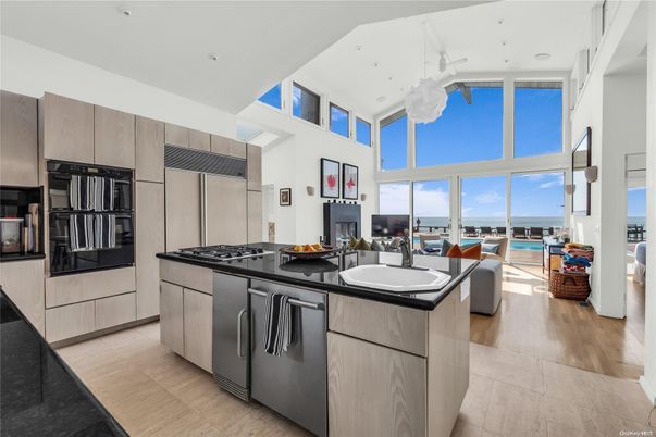 Fireplace, Interior, Kitchen, Living room, Recessed Lighting, Stainless Steel Appliances, Wood Texture Flooring
