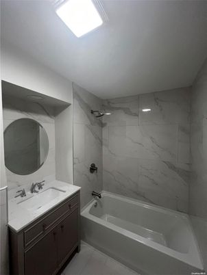 Bathroom, Dual Sink Vanities, Interior, Marble Walls, Recessed Lighting