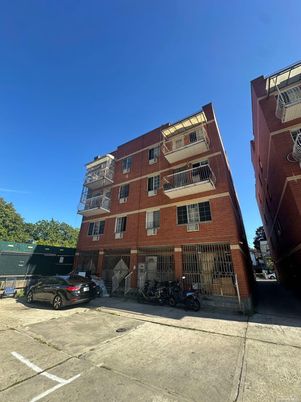 Exterior, Facade, Brick Facade, Condo Building