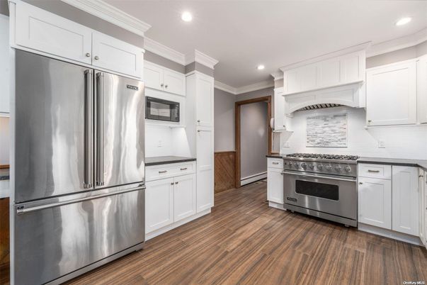 Interior, Kitchen, Recessed Lighting, Stainless Steel Appliances, Wood Texture Flooring