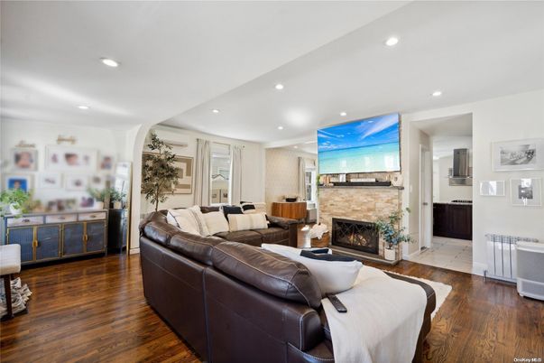 Fireplace, Interior, Living room, Recessed Lighting, Wood Texture Flooring