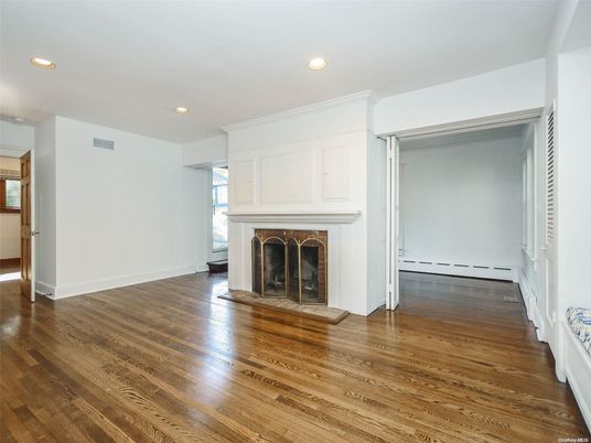 Empty room, Fireplace, Interior, Recessed Lighting, Wood Texture Flooring
