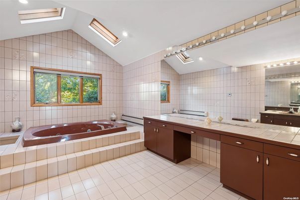 Bathroom, Dual Sink Vanities, Interior, Recessed Lighting, Tile Countertops