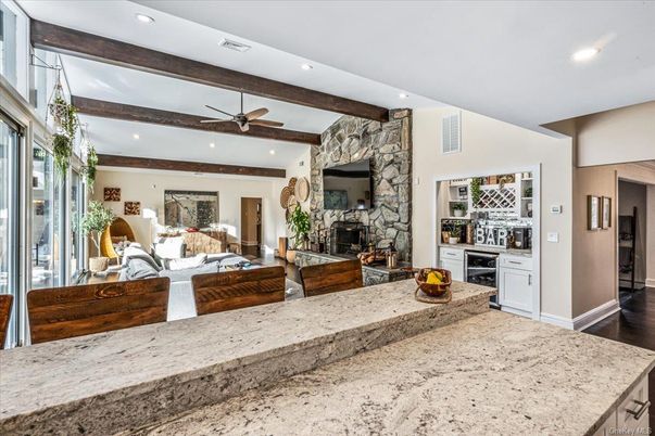 Fireplace, Interior, Kitchen, Living room, Recessed Lighting, Stone Walls, Wooden Beams, Wood Texture Flooring