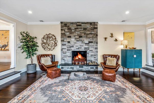Fireplace, Interior, Recessed Lighting, Stone Walls, Wood Texture Flooring