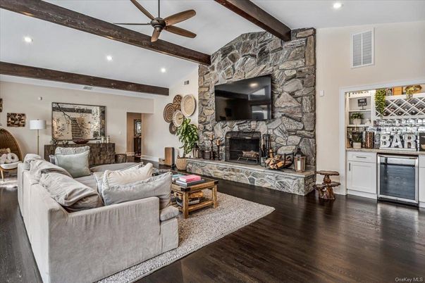 Fireplace, Interior, Living room, Recessed Lighting, Stone Walls, Wooden Beams, Wood Texture Flooring