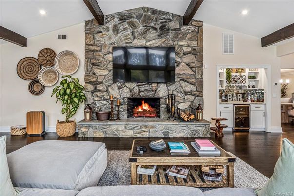 Fireplace, Interior, Living room, Recessed Lighting, Stone Walls, Wooden Beams, Wood Texture Flooring