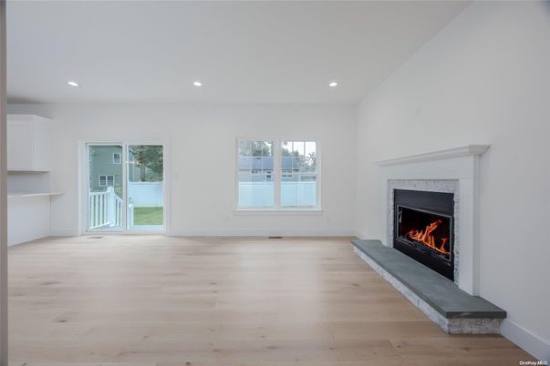 Empty room, Fireplace, Interior, Recessed Lighting, Wood Texture Flooring