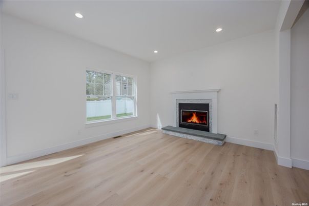 Empty room, Fireplace, Interior, Recessed Lighting, Wood Texture Flooring
