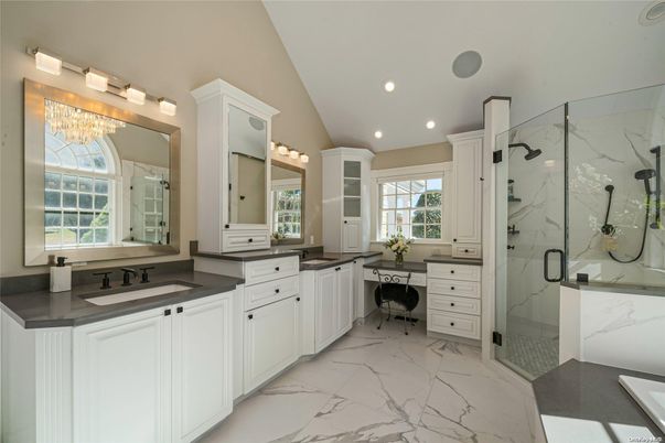 Bathroom, Dual Sink Vanities, Glass Shower, Interior, Marble, Marble Walls, Recessed Lighting