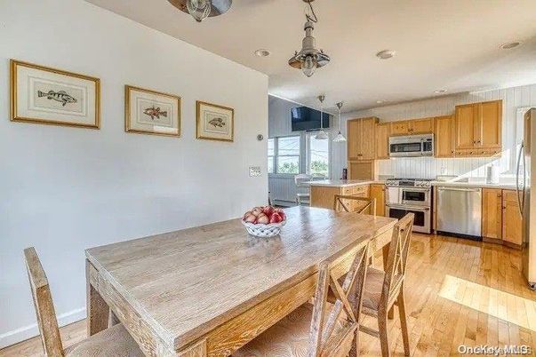 Dining room, Interior, Kitchen, Pendant Lights, Recessed Lighting, Stainless Steel Appliances, Wood Texture Flooring