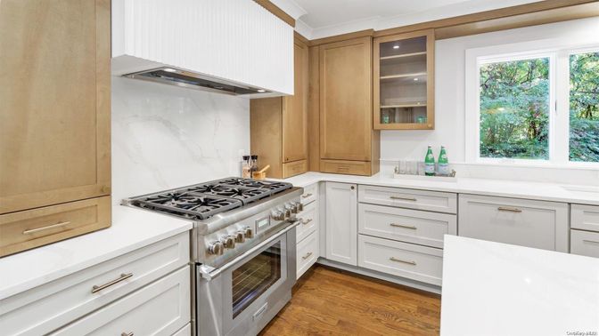 Interior, Kitchen, Marble Walls, Recessed Lighting, Stainless Steel Appliances, Wood Texture Flooring
