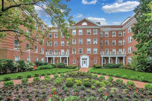 Exterior, Facade, Brick Facade, Condo Building